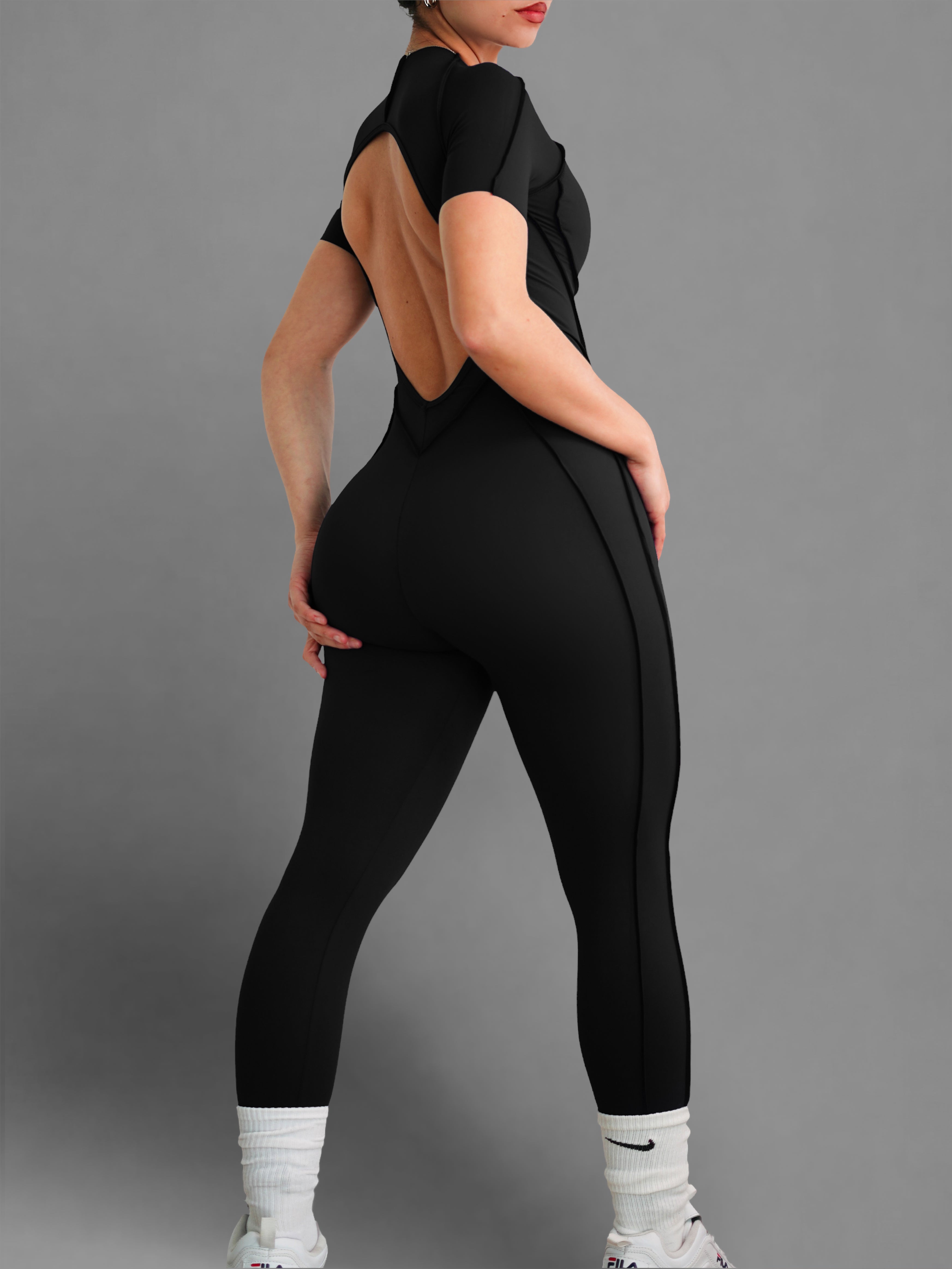 Seam Sculpt Backless Short Sleeve Jumpsuit (Black)